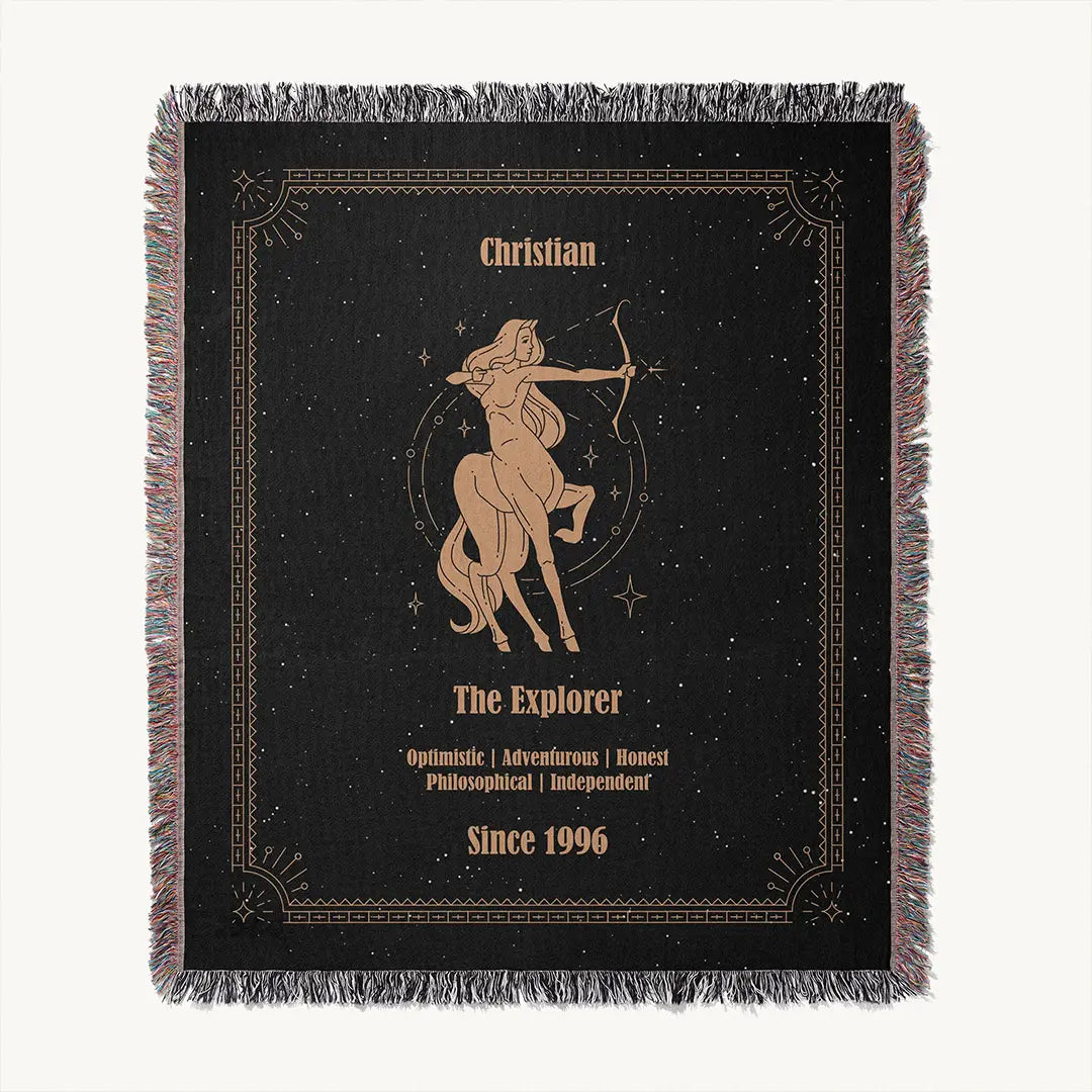 A Sagittarius-themed custom woven cotton blanket is laid flat on a white background, revealing the full illustration and personalized details.