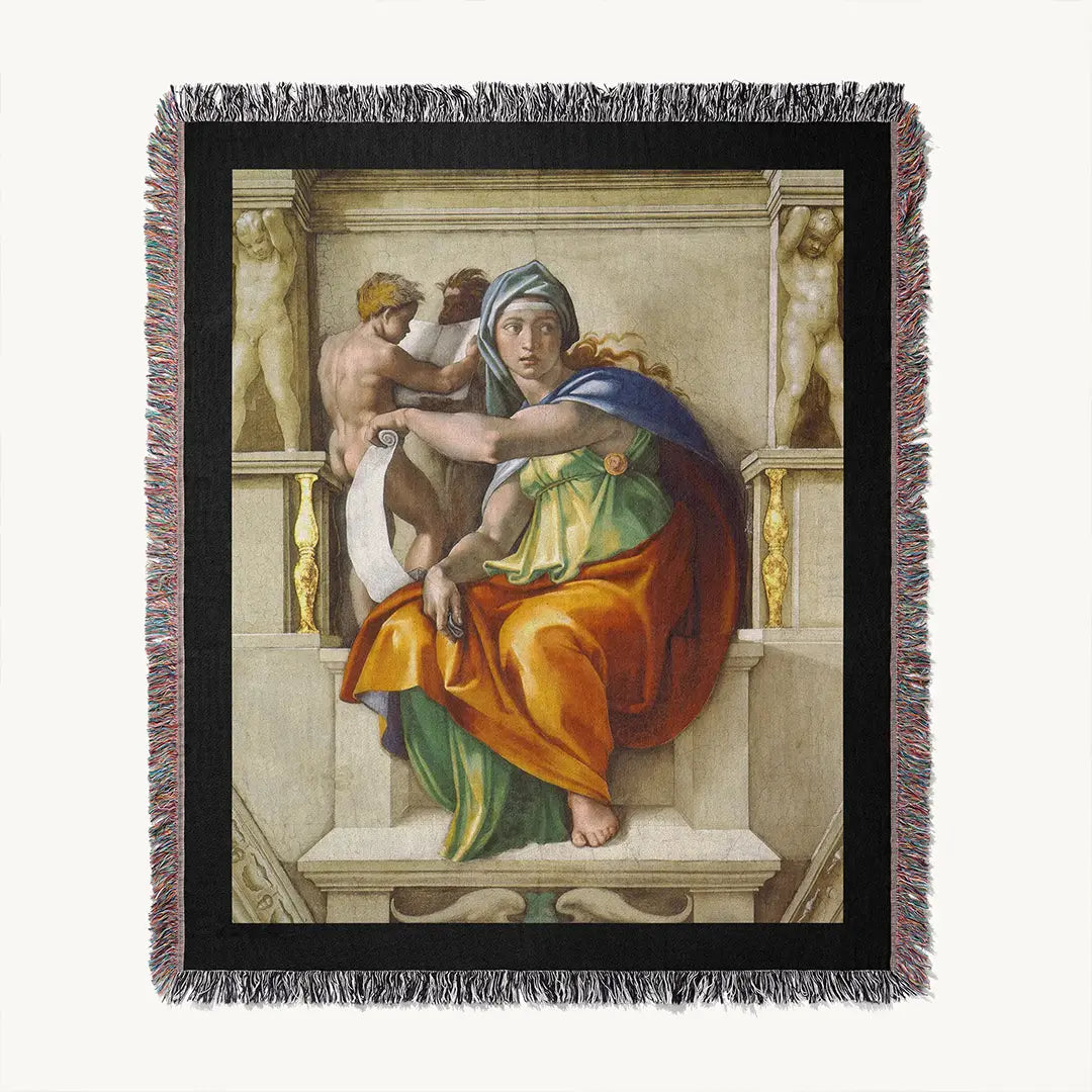 Framed view of the "Delphic Sibyl" woven blanket showing the full artwork in high detail, with black border and multicolor fringe, displayed on white background.